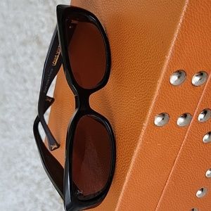 Authentic Louis Vuitton sunglasses.  Black and gold